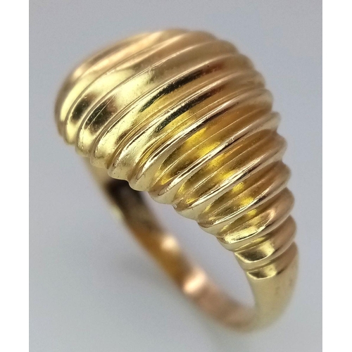 407 - A 14K Yellow Gold Ring in Decorative Shell Form. Size P. 3.95g weight.