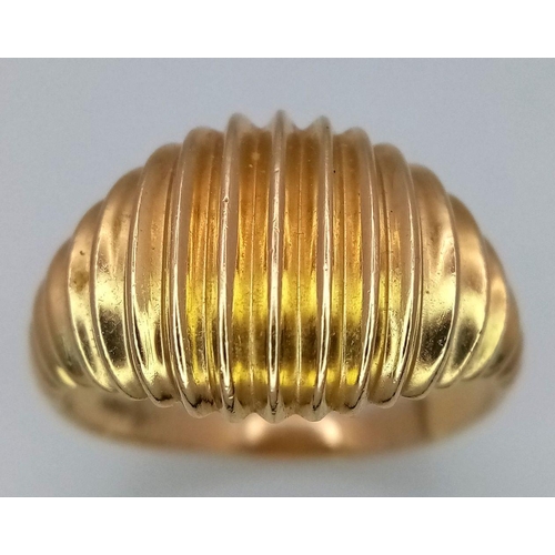 407 - A 14K Yellow Gold Ring in Decorative Shell Form. Size P. 3.95g weight.