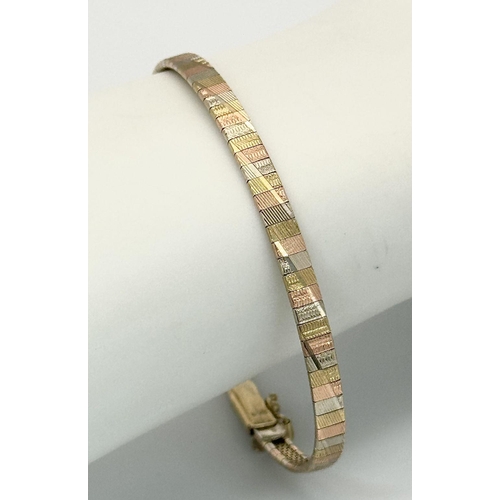 435 - A Vintage 9K Gold Tri Colour Bracelet. 18cm. 7g weight.