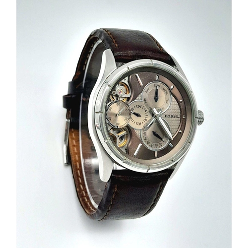 475 - A Fossil Twist Automatic Gents Watch. Brown leather strap. Stainless steel case - 44mm. Metallic dia... 