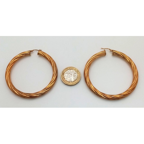 50 - A Pair of Very Large 9K Gold Creole Hoop Earrings. 6cm diameter. 8.64g total weight.