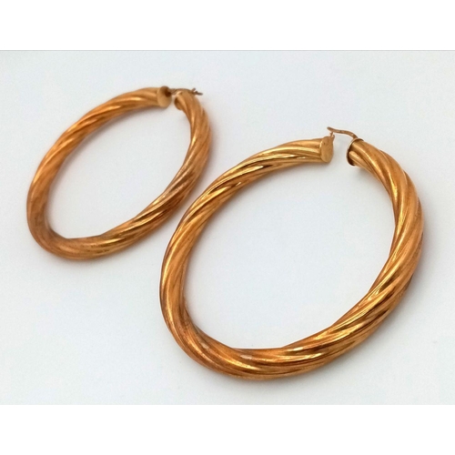 50 - A Pair of Very Large 9K Gold Creole Hoop Earrings. 6cm diameter. 8.64g total weight.