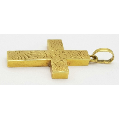 505 - An 18K Gold Cross Pendant. 3 x 2cm. 1.9g weight.