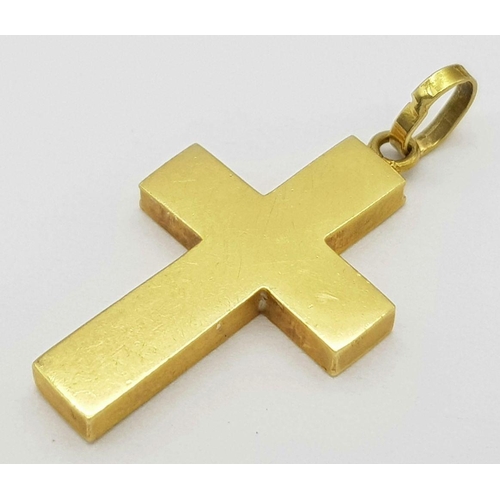 505 - An 18K Gold Cross Pendant. 3 x 2cm. 1.9g weight.