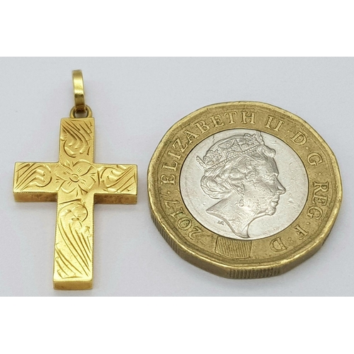 505 - An 18K Gold Cross Pendant. 3 x 2cm. 1.9g weight.