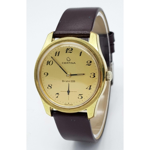 55 - A Vintage Bristol Certina 228 Gents Watch. Brown leather strap. Gilded case - 35mm. Gold tone dial w... 