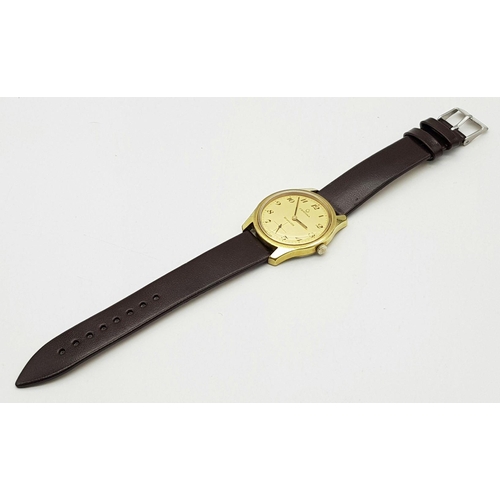 55 - A Vintage Bristol Certina 228 Gents Watch. Brown leather strap. Gilded case - 35mm. Gold tone dial w... 