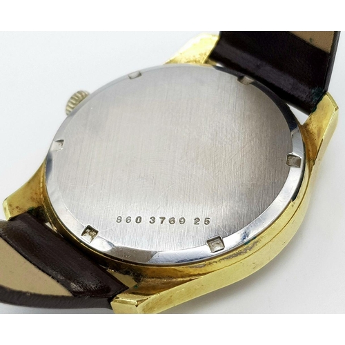 55 - A Vintage Bristol Certina 228 Gents Watch. Brown leather strap. Gilded case - 35mm. Gold tone dial w... 