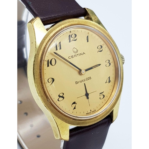 55 - A Vintage Bristol Certina 228 Gents Watch. Brown leather strap. Gilded case - 35mm. Gold tone dial w... 