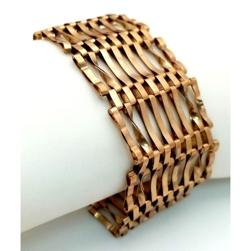 57 - A 9K Yellow Gold Gate Bracelet with Clasp. 16cm. 16.76g weight.