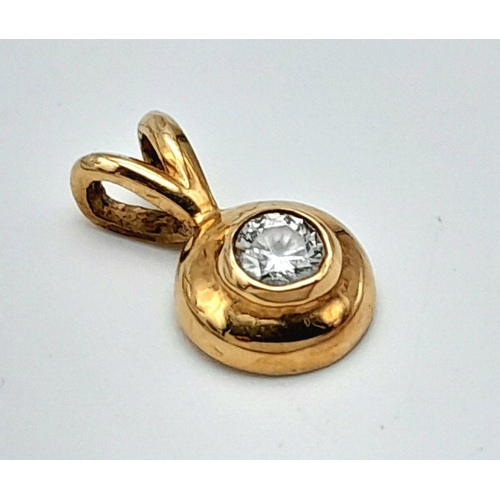 875 - A 9K Yellow Gold Diamond Pendant. 10mm. 0.65g total weight. 0.20ct diamond.