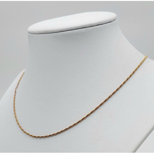 884 - A 9K Yellow Gold Disappearing Necklace. 40cm. 2.3g weight.