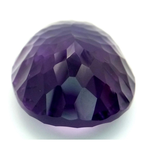 1129 - A 95.21ct Bolivian Amethyst Gemstone. Oval shape, concave cut. Comes with GFCO certificate. Ref: ZK ... 