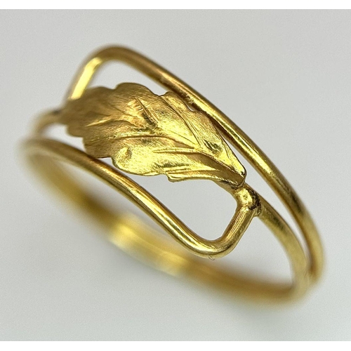 1248 - An 18K Yellow Gold (tested) Crossover Decorative Leaf Ring. Size K 1/2. 1.4g weight.