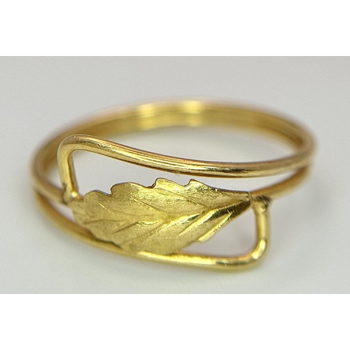 1248 - An 18K Yellow Gold (tested) Crossover Decorative Leaf Ring. Size K 1/2. 1.4g weight.