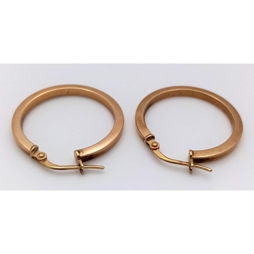 1332 - A Pair of 9K Yellow Gold Hoop Earrings. 22mm diameter. 1.2g total weight.