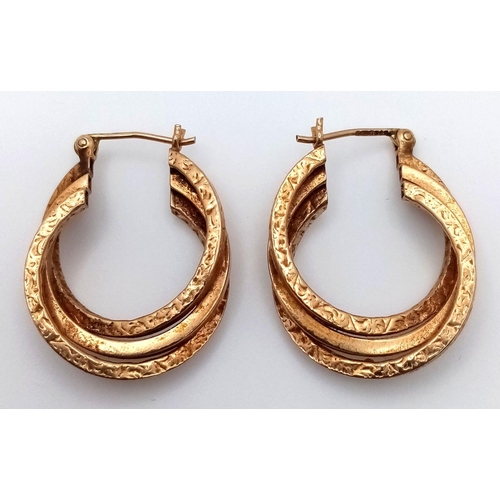 1339 - A Pair of 9K Yellow Gold Three Hoop Earrings. 2cm diameter. 3.8g total weight.