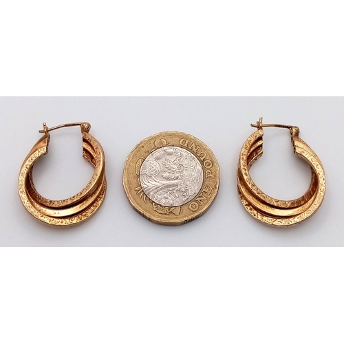 1339 - A Pair of 9K Yellow Gold Three Hoop Earrings. 2cm diameter. 3.8g total weight.