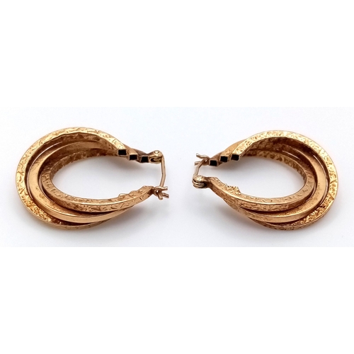 1339 - A Pair of 9K Yellow Gold Three Hoop Earrings. 2cm diameter. 3.8g total weight.