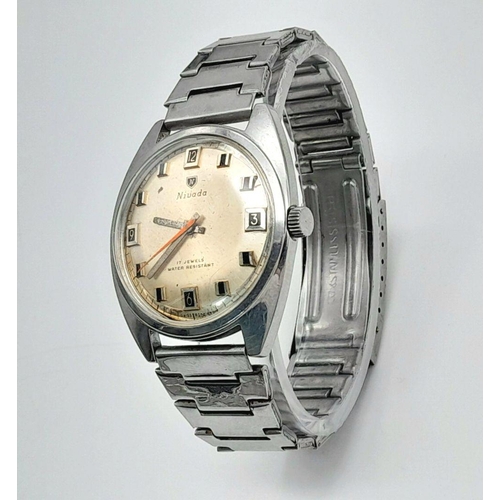 1344 - A Vintage Nivada Hand-Wind Gents Watch. Stainless steel bracelet and case - 38mm. Gilded dial with d... 