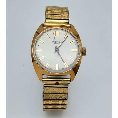 1351 - A Vintage Sekonda Manuel-Wind Gents Watch. Expandable bracelet. Gilded case - 35mm. White dial. In w... 