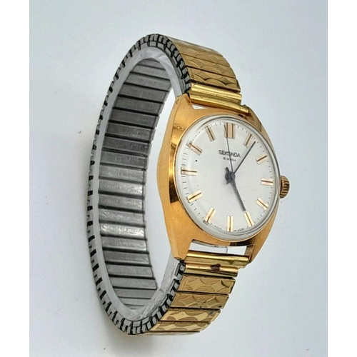 1351 - A Vintage Sekonda Manuel-Wind Gents Watch. Expandable bracelet. Gilded case - 35mm. White dial. In w... 