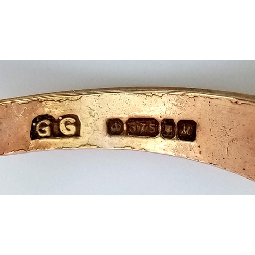 1367 - A Vintage 9K Yellow Gold Belt Ring. Size P. 2.1g weight.