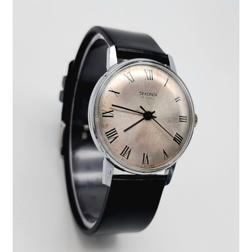 1372 - A Vintage Sekonda Manuel-Wind Gents Watch. Stainless steel case - 35mm. Silver tone dial. In working... 