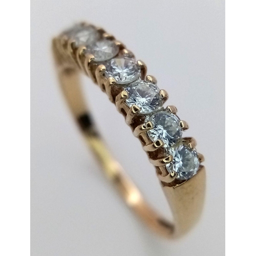 1381 - A 9K Yellow Gold White Zircon Ring. Size P. 1.8g total weight.