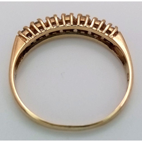 1381 - A 9K Yellow Gold White Zircon Ring. Size P. 1.8g total weight.