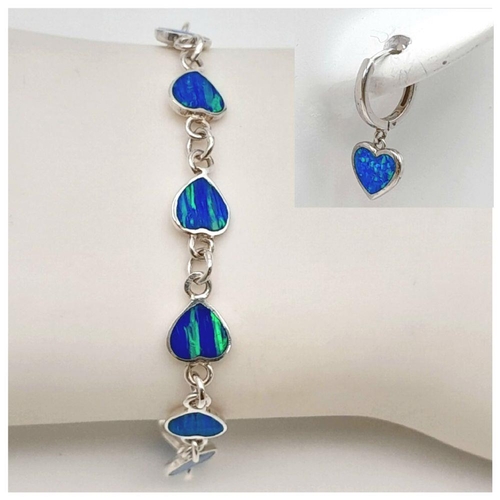 1382 - A matching set of 925 silver Opal jewellery include 2 pairs of hoop earrings and a  link bracelet (1... 