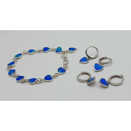 1382 - A matching set of 925 silver Opal jewellery include 2 pairs of hoop earrings and a  link bracelet (1... 