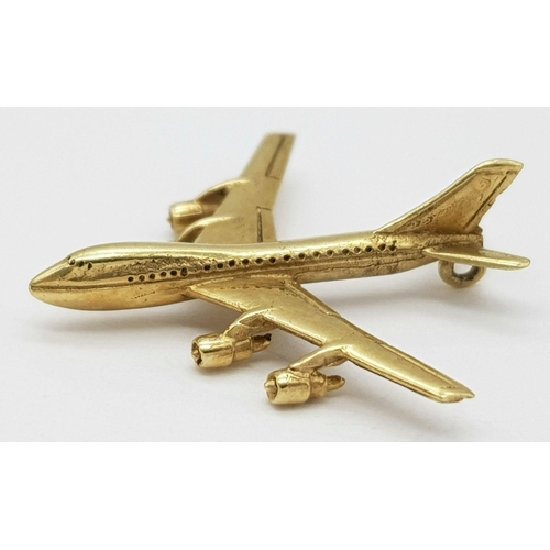 142 - A 9K Yellow Gold Jumbo Jet Pendant/Charm. 35mm wingspan. 3.75g weight.