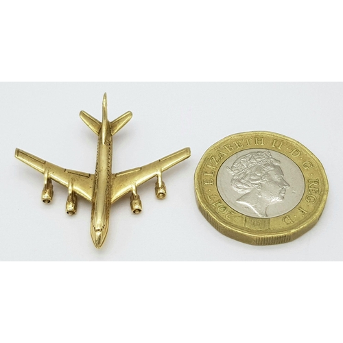 142 - A 9K Yellow Gold Jumbo Jet Pendant/Charm. 35mm wingspan. 3.75g weight.
