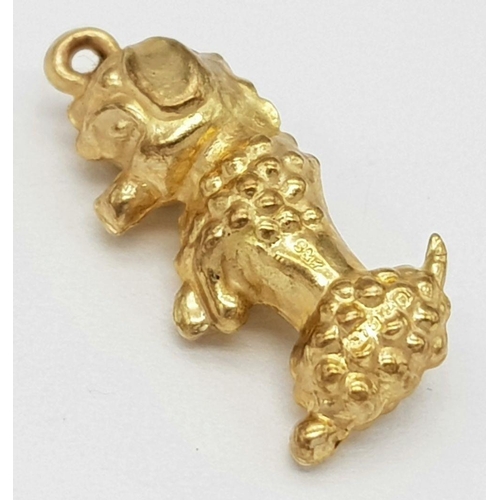 1598 - A 9K Yellow Gold Poodle Pendant/Charm. 20mm. 0.8g.