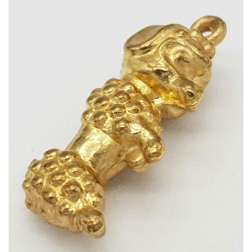 1598 - A 9K Yellow Gold Poodle Pendant/Charm. 20mm. 0.8g.