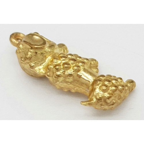 1598 - A 9K Yellow Gold Poodle Pendant/Charm. 20mm. 0.8g.