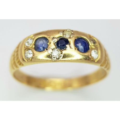 166 - AN 18K YELLOW GOLD ANTIQUE DIAMOND & SAPPHIRE RING. 3.1G IN WEIGHT. SIZE P. HALLMARKED BIRMINGHAM 18... 