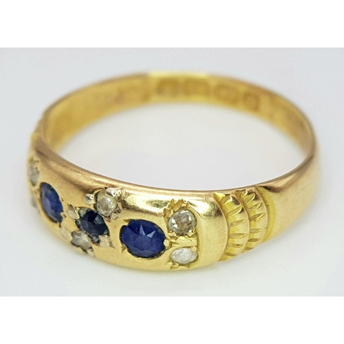 166 - AN 18K YELLOW GOLD ANTIQUE DIAMOND & SAPPHIRE RING. 3.1G IN WEIGHT. SIZE P. HALLMARKED BIRMINGHAM 18... 