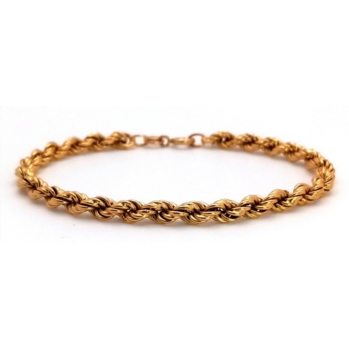 38 - An 18K Yellow Gold Rope Bracelet. 16cm length. 4.3g weight.