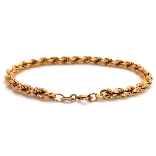 38 - An 18K Yellow Gold Rope Bracelet. 16cm length. 4.3g weight.