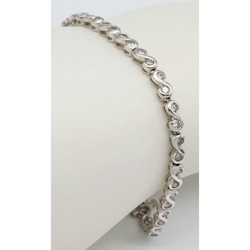 40 - A 14K WHITE GOLD DIAMOND SET IN THE INTERLOCKING DESIGN BRACELET 9.8G , APPROX 19CM , 0.75CT. Ref: S... 