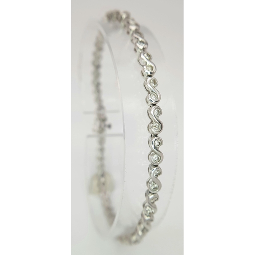 40 - A 14K WHITE GOLD DIAMOND SET IN THE INTERLOCKING DESIGN BRACELET 9.8G , APPROX 19CM , 0.75CT. Ref: S... 