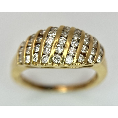 425 - A 9K YELLOW GOLD DIAMOND SET RING 0.65CT. 4.6G IN WEIGHT. SIZE N AND 1/2. Ref: SC 6040