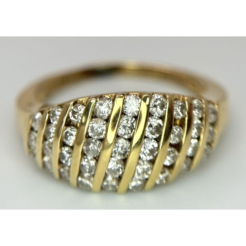 425 - A 9K YELLOW GOLD DIAMOND SET RING 0.65CT. 4.6G IN WEIGHT. SIZE N AND 1/2. Ref: SC 6040