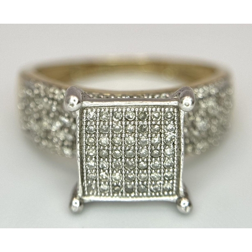 432 - A 9K YELLOW GOLD DIAMOND RING. 0.50CT. 3.4G IN WEIGHT. SIZE N AND 1/2. Ref: SC 6055