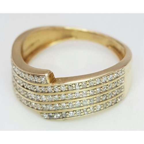 523 - A 9K YELLOW GOLD DIAMOND 4 ROW RING 0.30CT. 2.4G IN WEIGHT. SIZE K. Ref: 6117