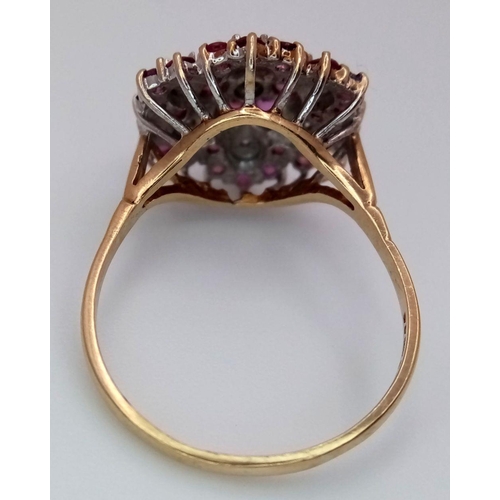 642 - A 9K YELLOW GOLD DIAMOND & RUBY CLUSTER RING 3.7G SIZE S. Ref: SC 6015