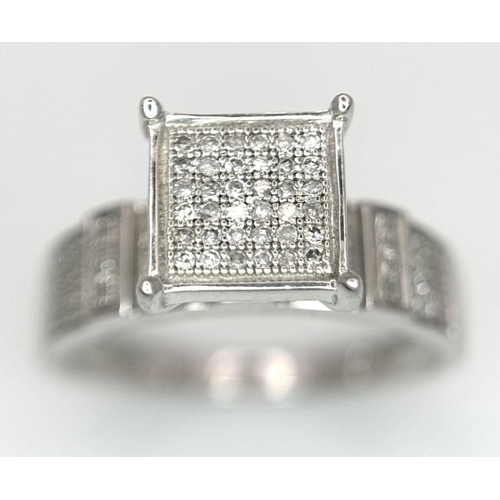 663 - A 9K WHITE GOLD FANCY DIAMOND RING 0.40CT 3G SIZE N 1/2. Ref: SC 6005