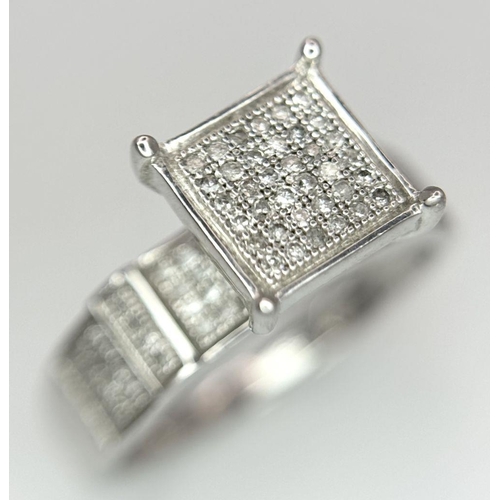 663 - A 9K WHITE GOLD FANCY DIAMOND RING 0.40CT 3G SIZE N 1/2. Ref: SC 6005